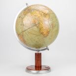 A mid-century globe Columbus Erdglobus Modell 200. Made of aluminium, wood and cardboard. (50 x 33 c