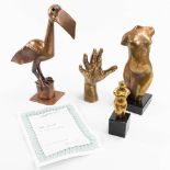 A collection of 2 bronze torso's, marked Michel 7/200 and Co. Paris, a bird made of bronze marked J.