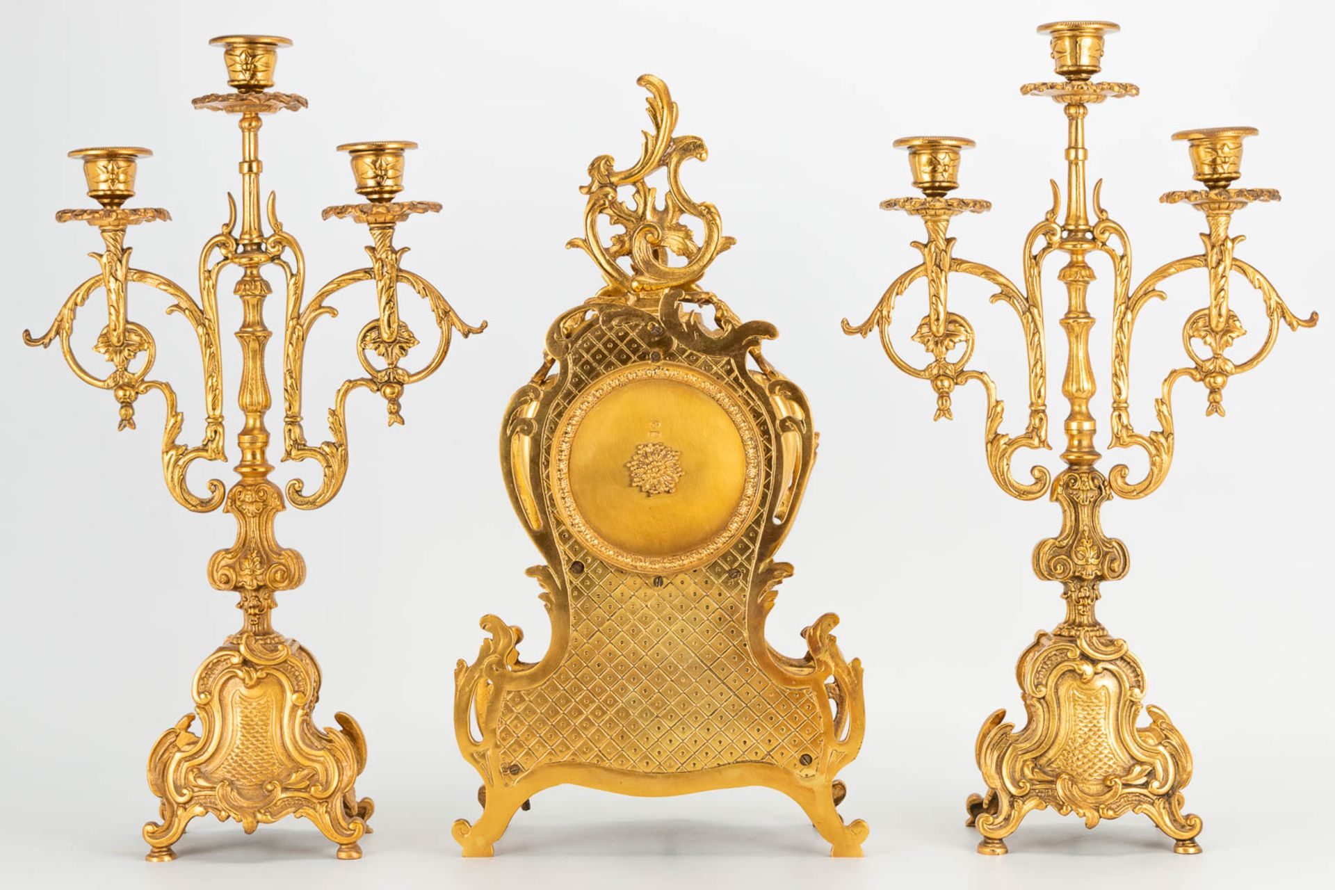 A 3 piece garniture clockset made of bronze, consisting of a clock and 2 candelabra. (9 x 22 x 41 cm - Image 9 of 17