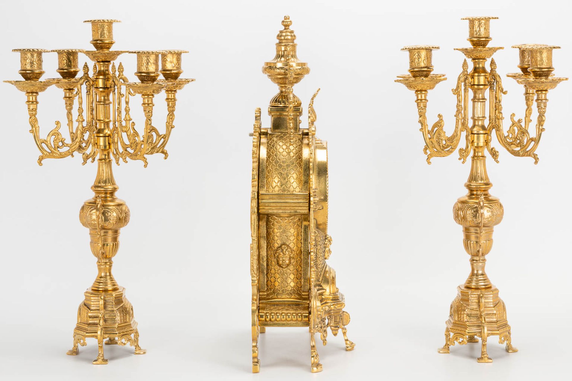 A 3 piece garniture clockset made of bronze, consisting of a clock and 2 candelabra. Battery operate - Image 3 of 14