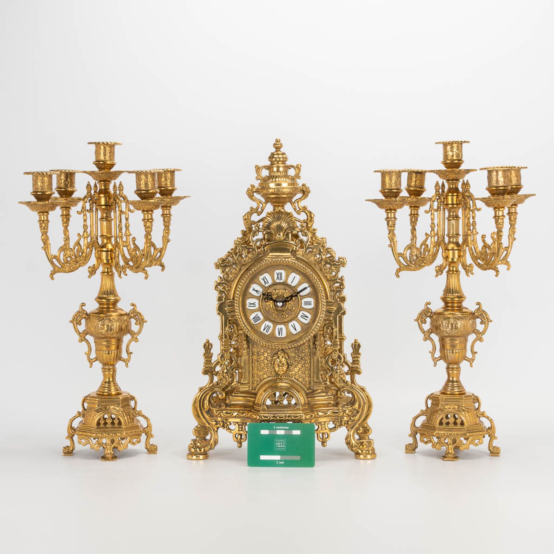 A 3 piece garniture clockset made of bronze, consisting of a clock and 2 candelabra. Battery operate - Image 2 of 14