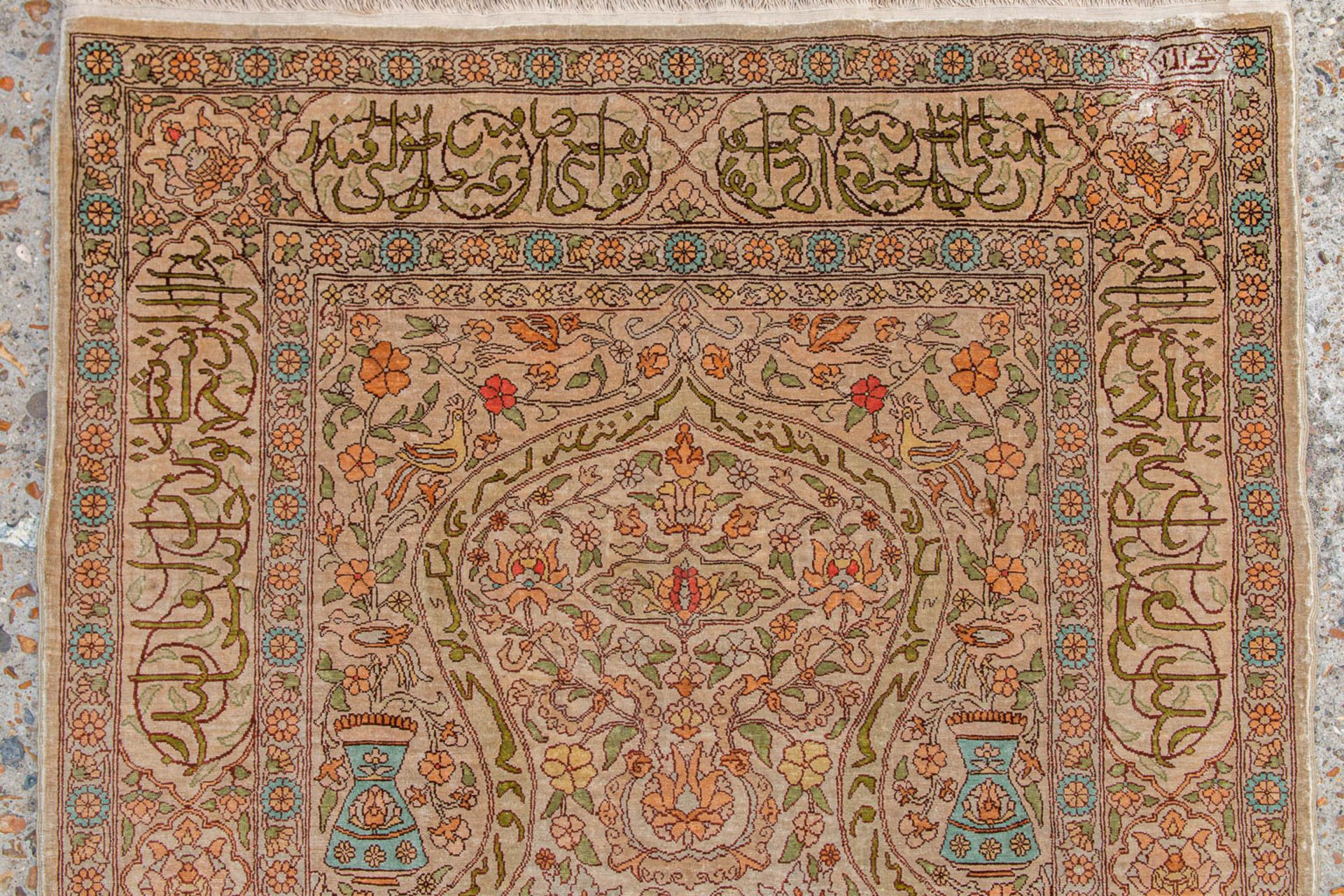 An Oriental hand-made carpet made of silk and signed. (73,5 x 107 cm) - Image 4 of 6