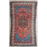 An Oriental hand-made carpet. (126 x 211 cm)