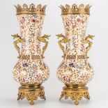 A pair of bronze mounted faience vases marked J. Fischer Budapest, Hungary. (54 x 19 cm)