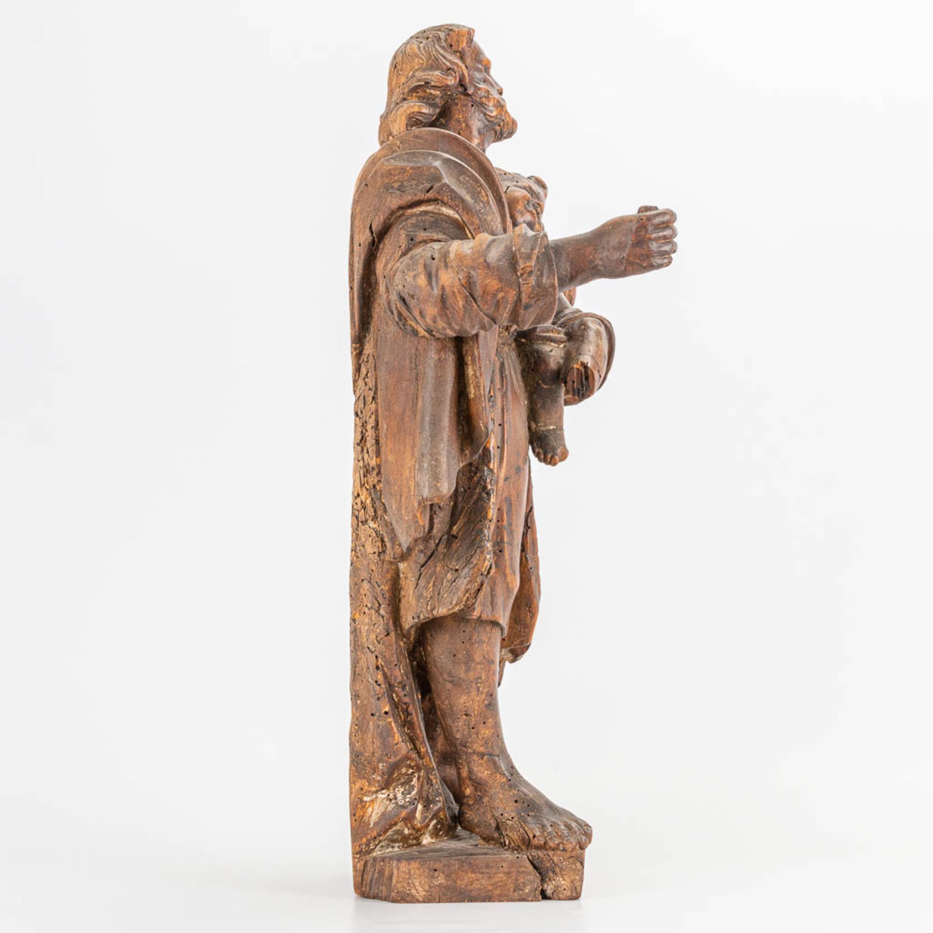 An antique wood sculptured statue of 'Joseph and Child.' 17th/18th century. (14 x 27 x 48 cm) - Image 3 of 11