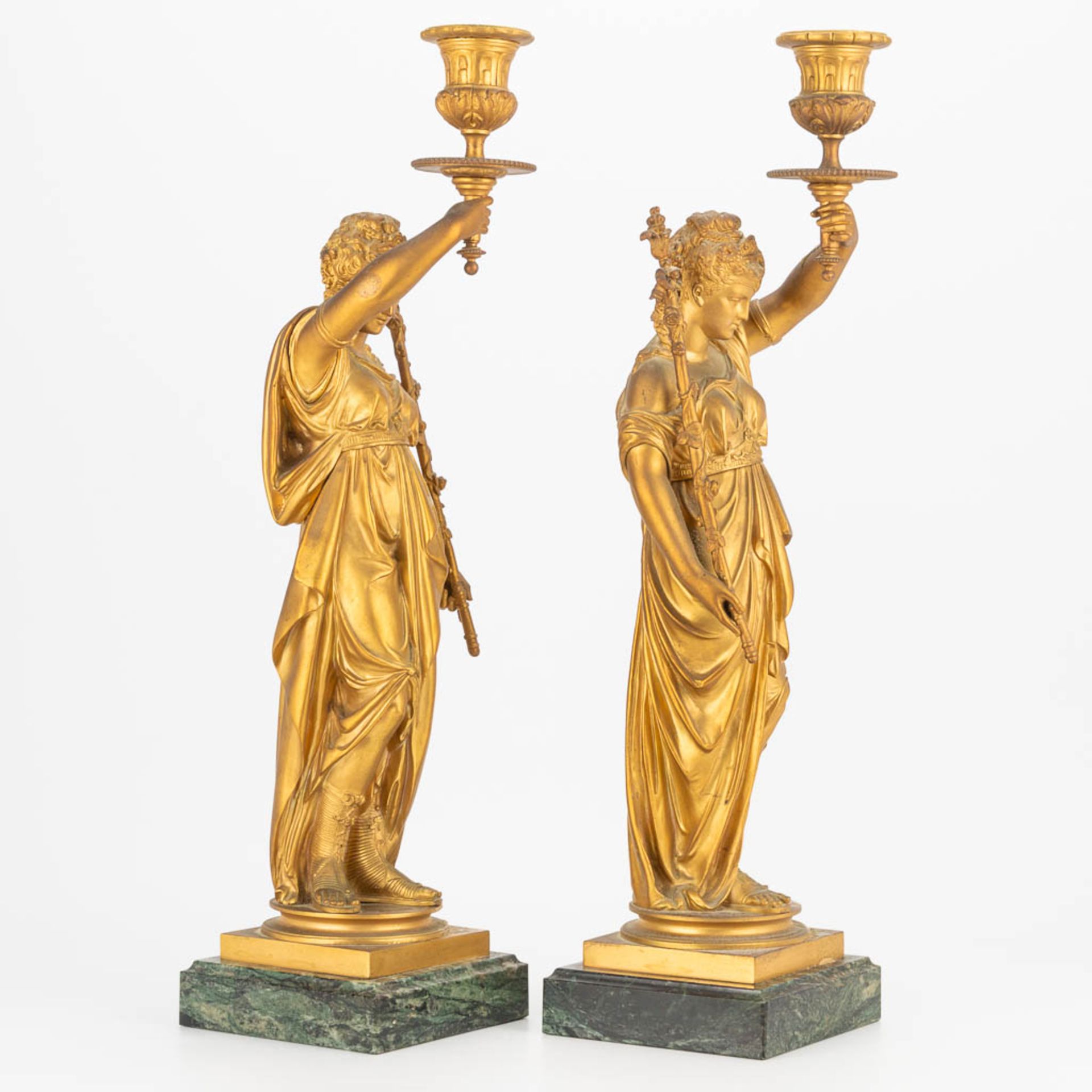 A pair of candlesticks made of gilt bronze with a pair of Greek-Roman ladies, marble base. Second ha - Image 3 of 18