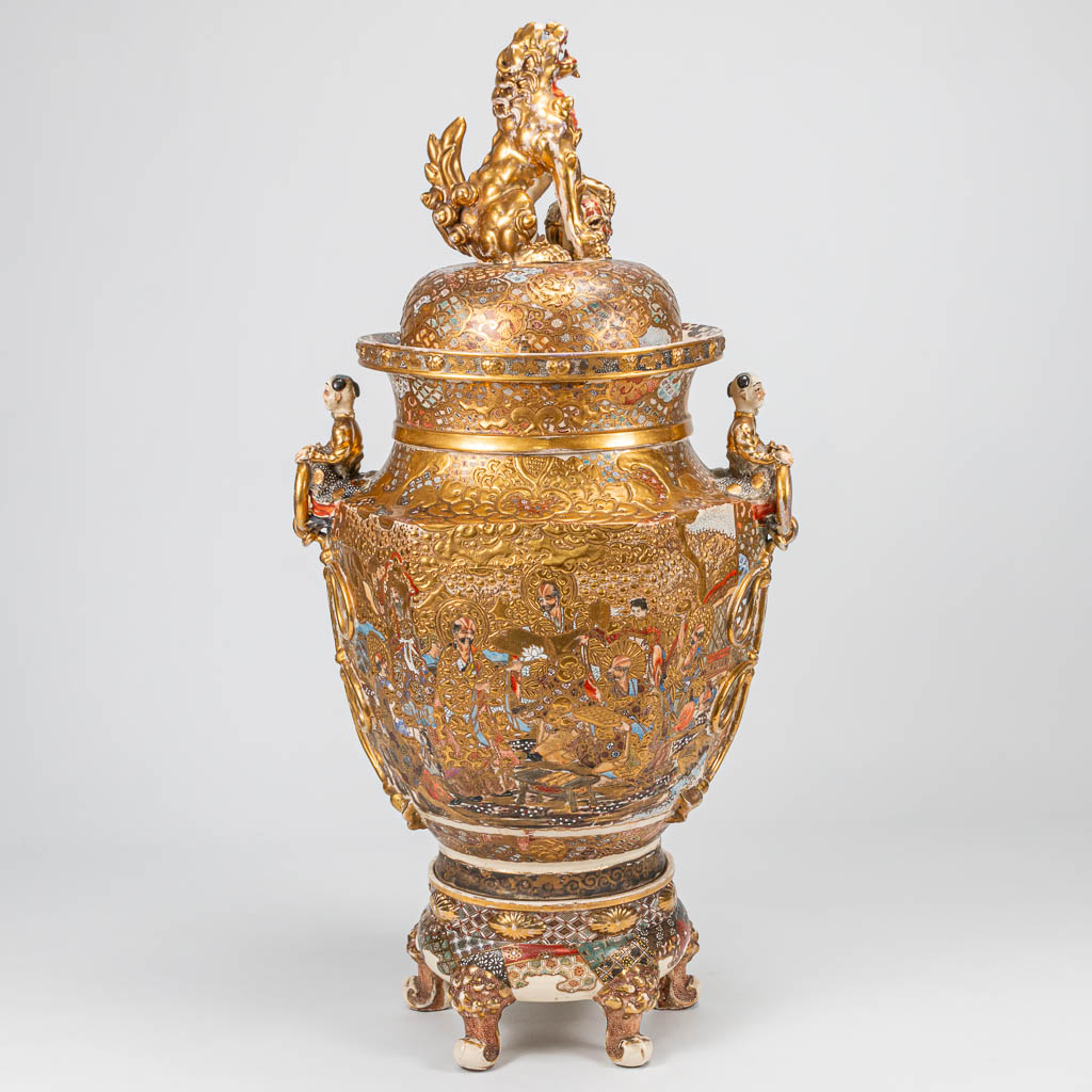 An exceptionally large Satsuma vase with lid on ceramic base, Emperor decor, Japan 19th century. (28