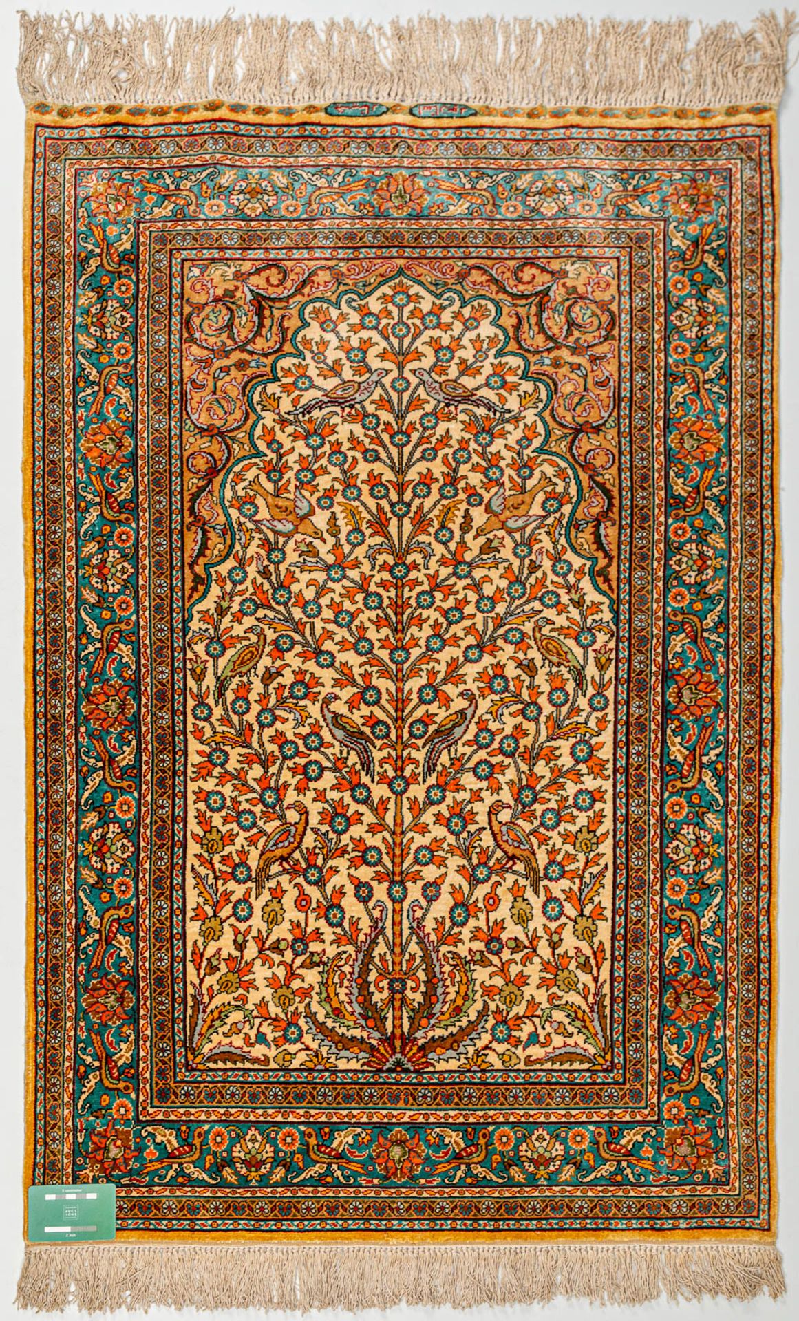 A hand-made silk carpet with 'Tree of life' decor and marked Kayseri. Signed. (112 x 75 cm) (75 x 11 - Image 8 of 8