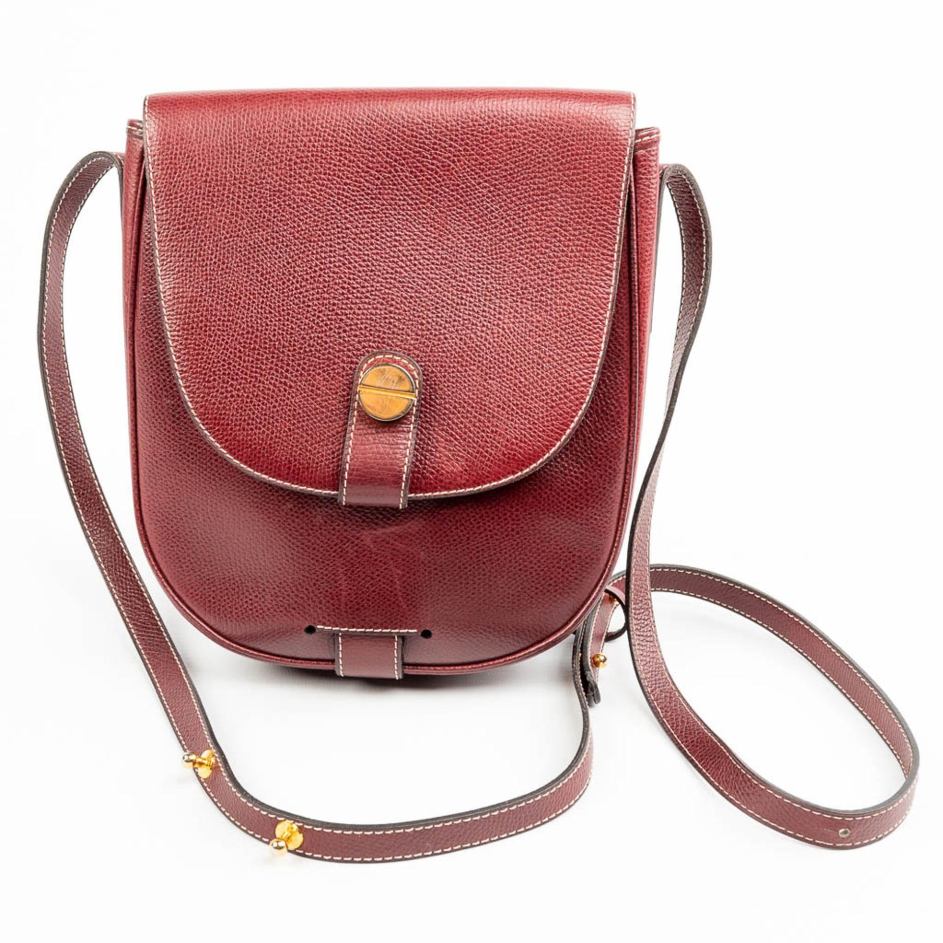 A purse made of red leather and marked Delvaux. - Image 10 of 10