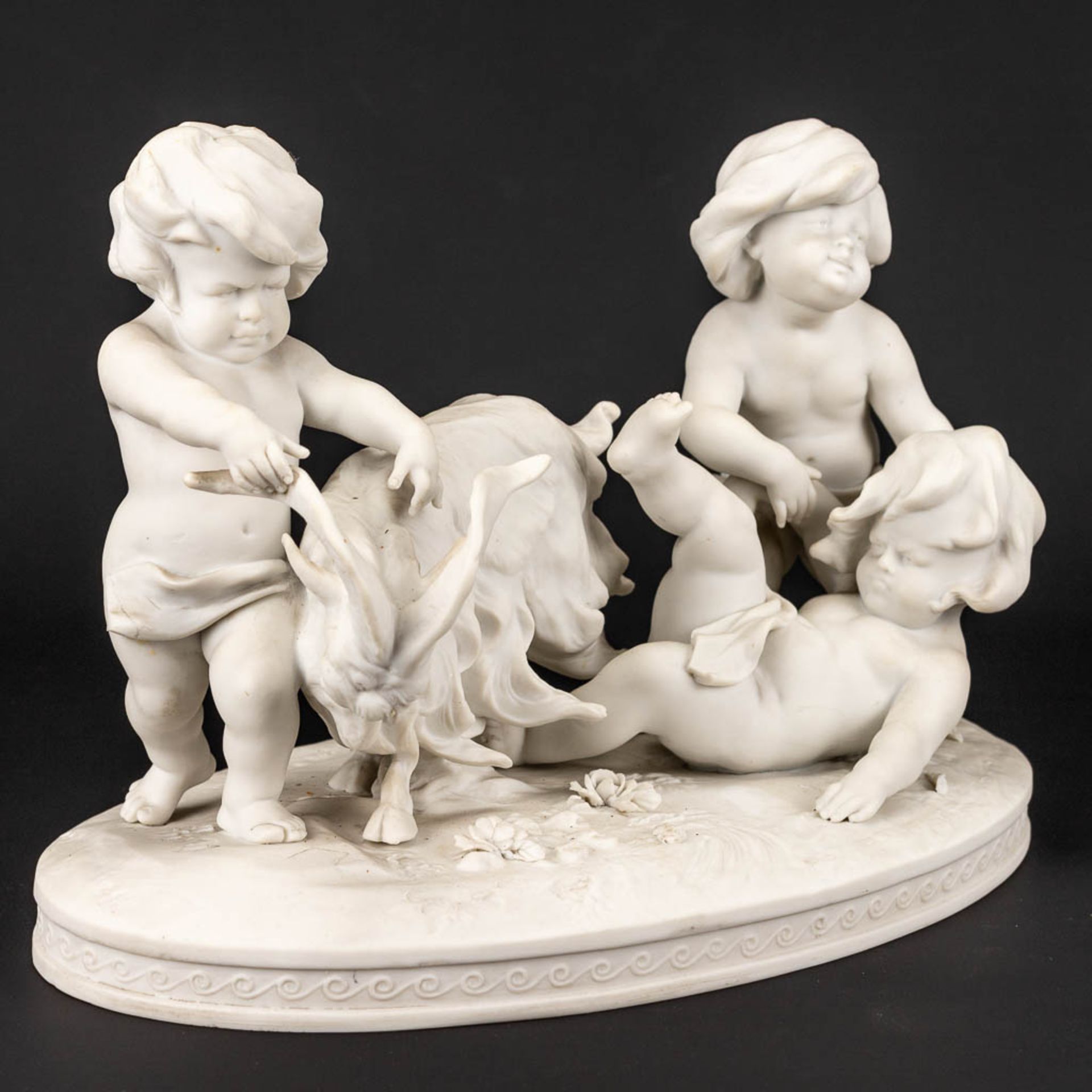 A group of kids and a goat made of biscuit porcelain and marked Richard Eckert& Co, Volkstedt. - Image 9 of 15