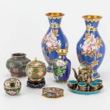 A collection of bronze items with a cloisonnŽ decor.