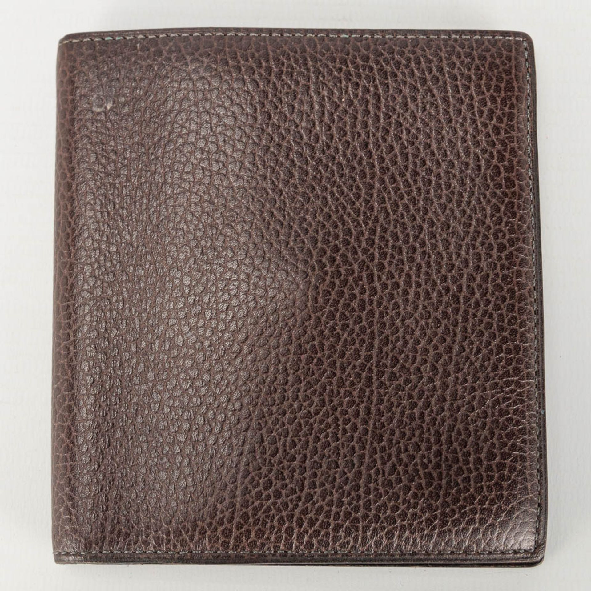 A collection of 2 wallets and a bifold made of leather and marked Delvaux. - Image 8 of 16