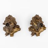 A pair of wall lamps with 'Bacchus' figurines made of bronze.
