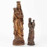 A collection of 2 wood sculptured madonnas with a child