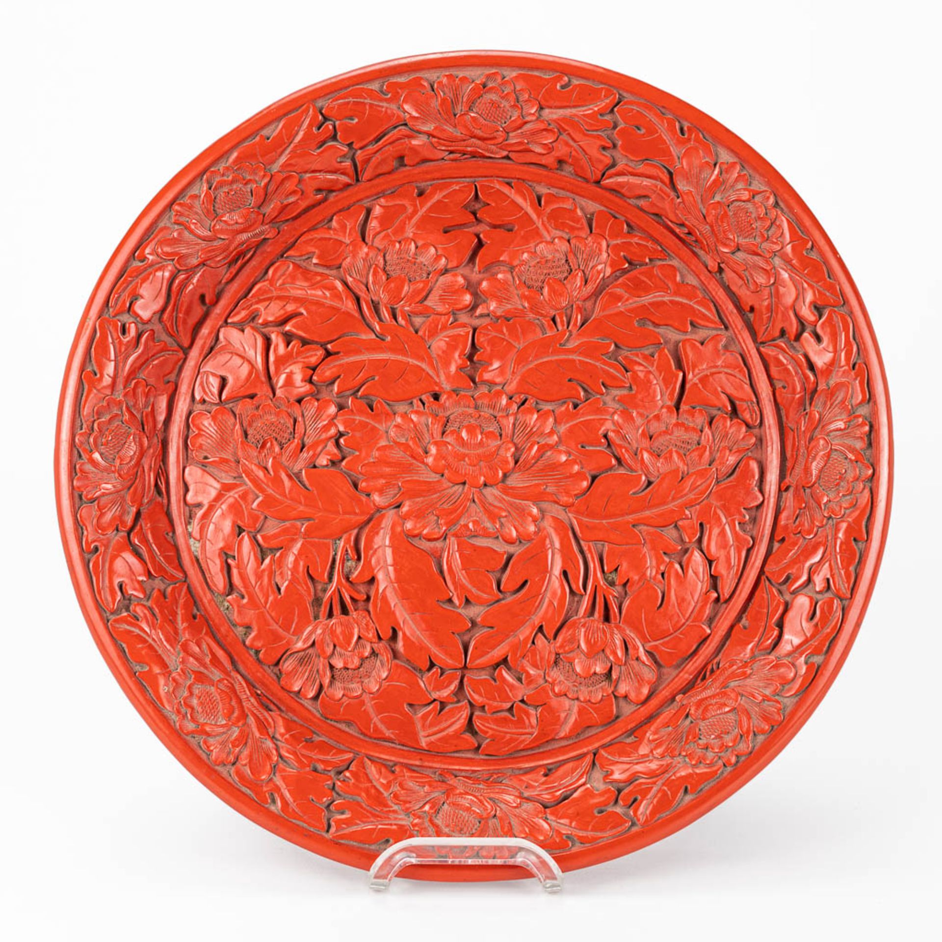 A plate made of lacquered cinnabar and made in China.