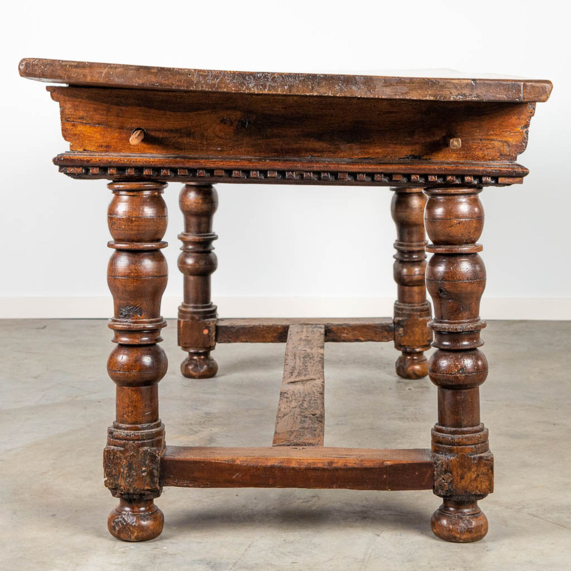 An antique table with 6 drawers, made during the 17th century. - Image 3 of 12