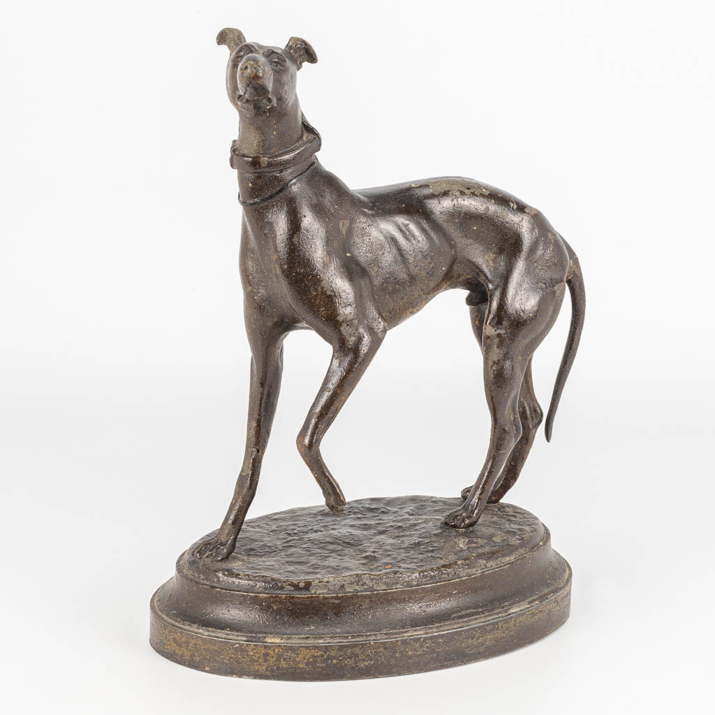 A statue of a greyhound made of spelter, Illegibly signed.