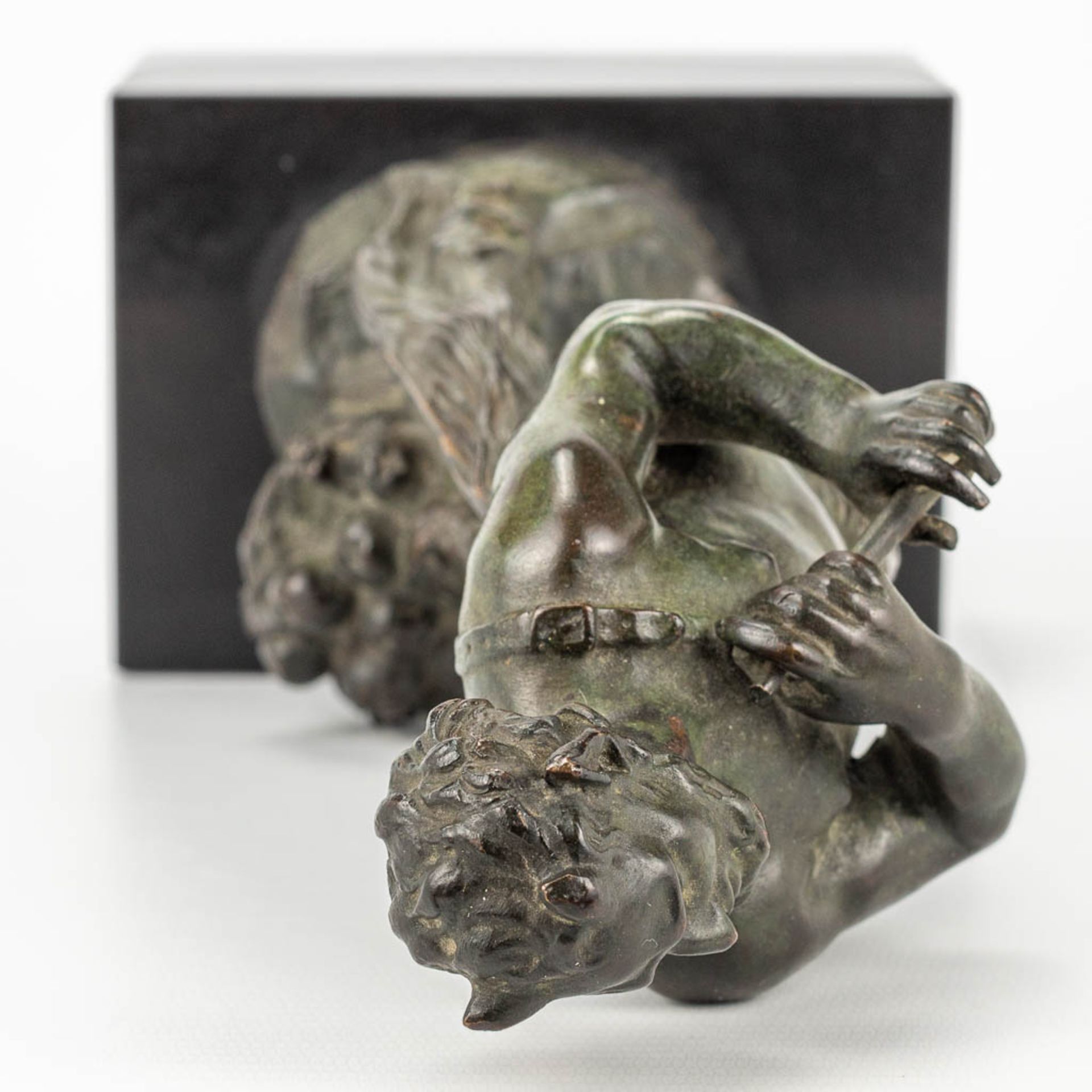 A Satyr figurine, made of bronze and mounted on a black marble base. - Image 7 of 10