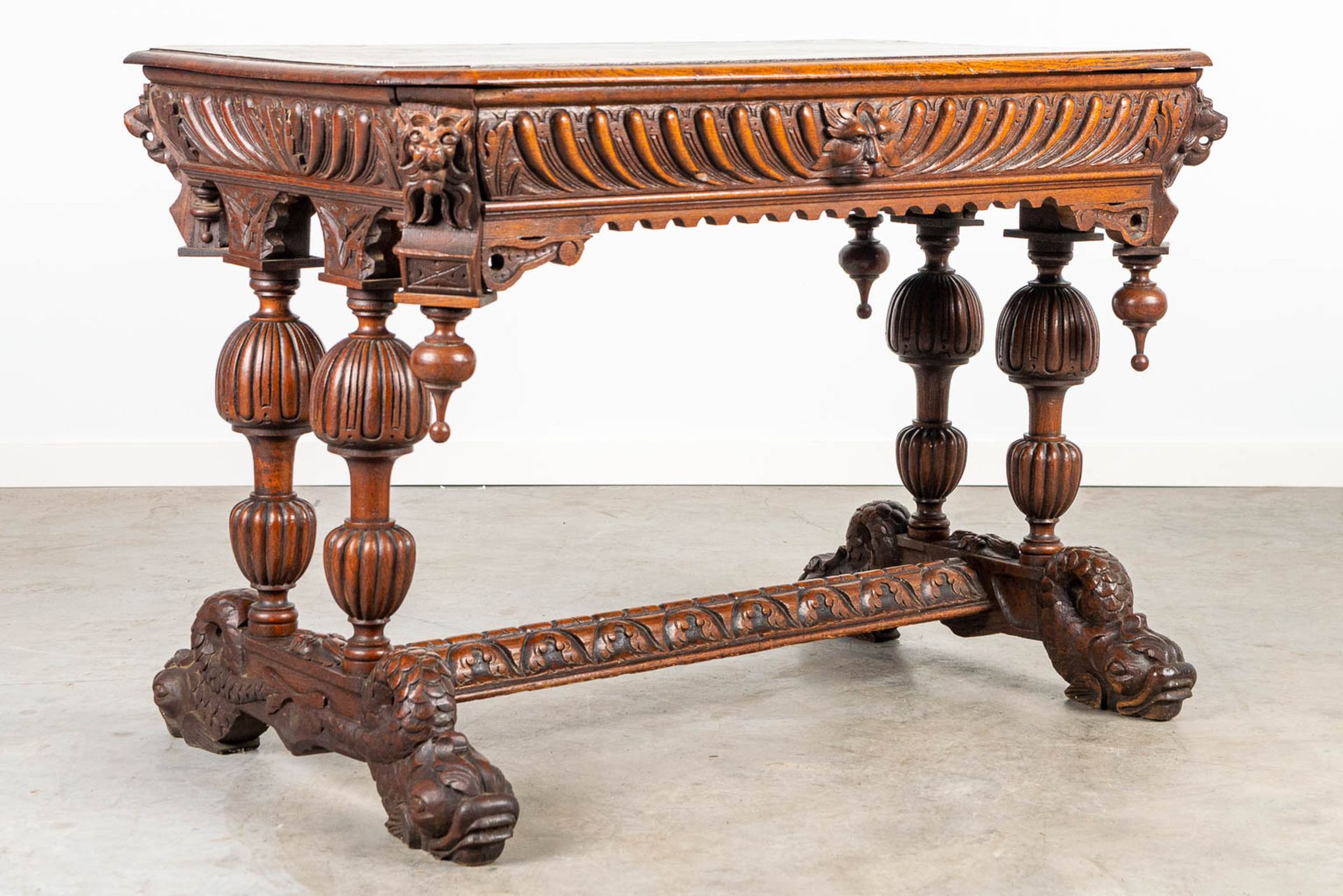 A desk made of oak and decorated with wood sculptured Dolphins. - Image 7 of 9