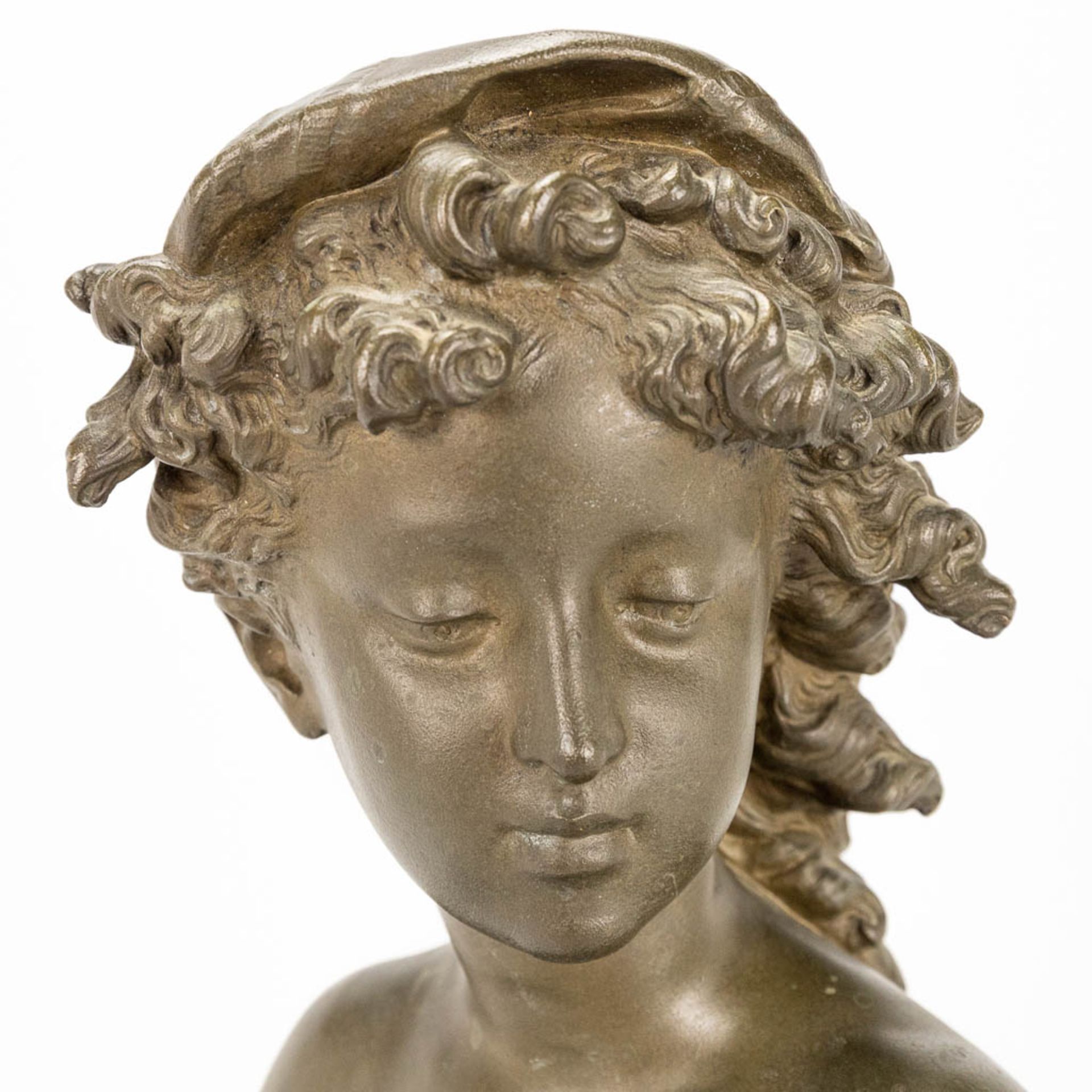 A bust of a young lady, made of bronze and marked Compagnie des bronzes, Bruxelles. - Image 7 of 11