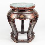 A side table decorated with flowers and finished with cloisonnŽ.