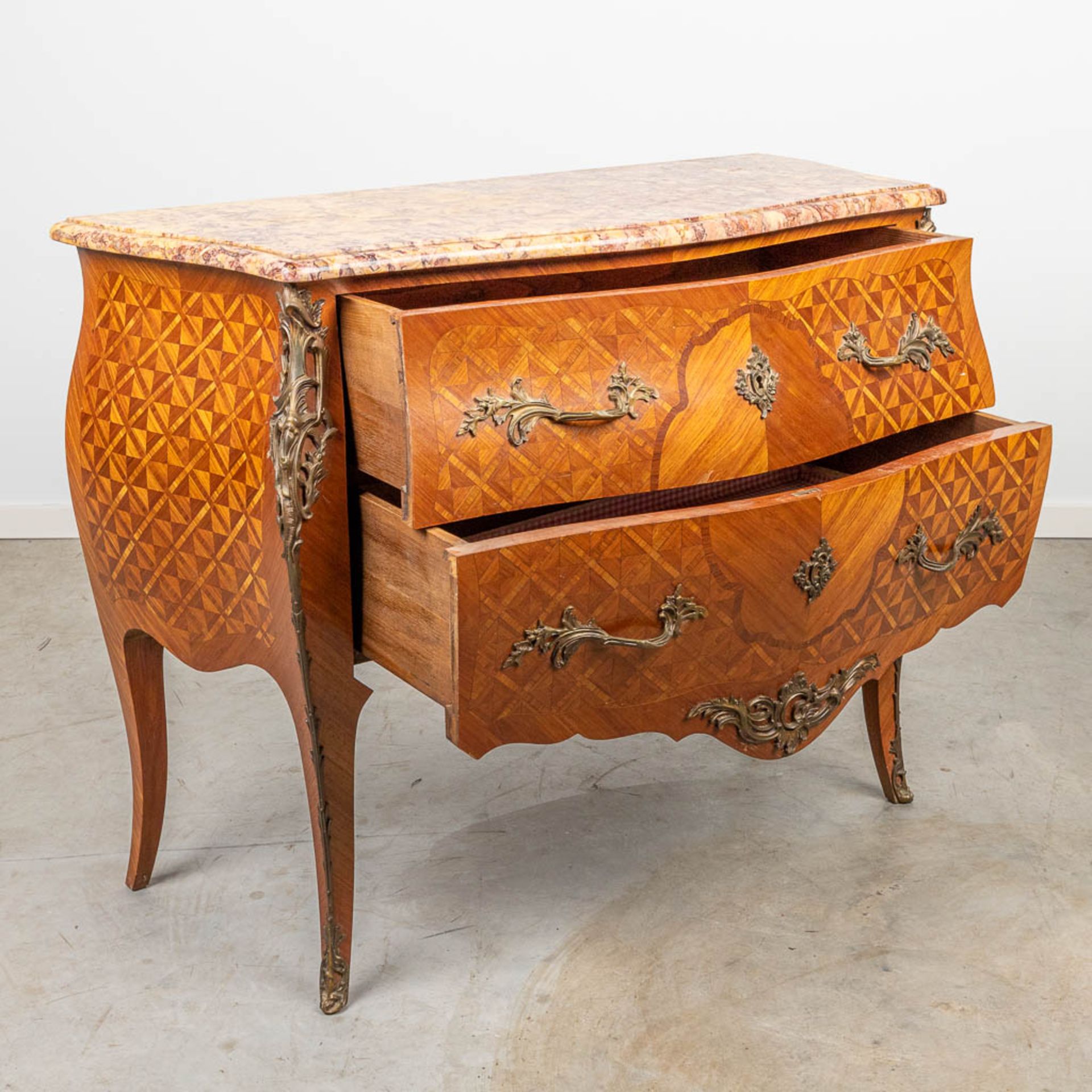 A commode with a marble top and finished with bronze in Louis XV style. - Image 8 of 12