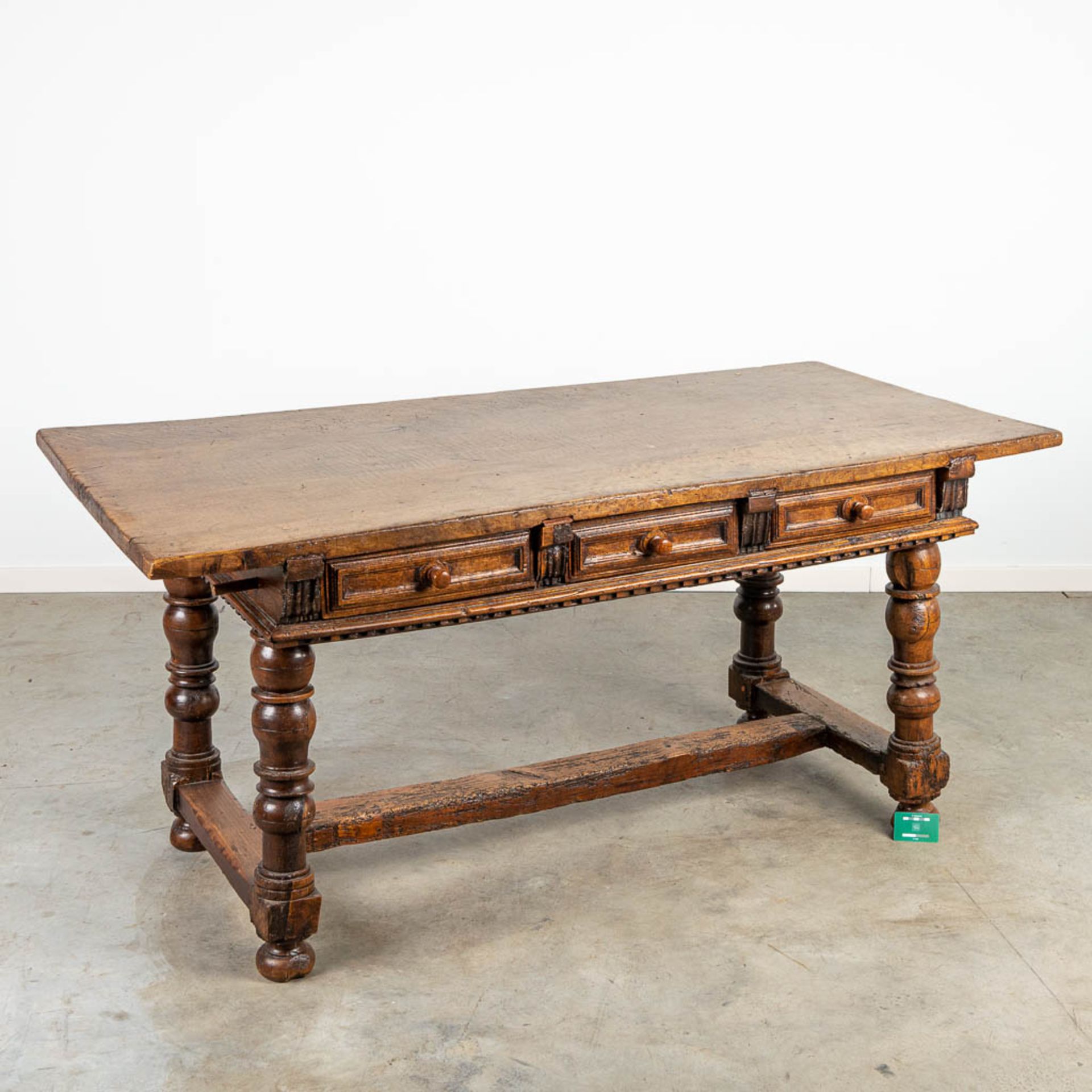 An antique table with 6 drawers, made during the 17th century. - Image 2 of 12
