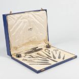 A large silver-plated manicure set in the original box and marked Wiskemann.