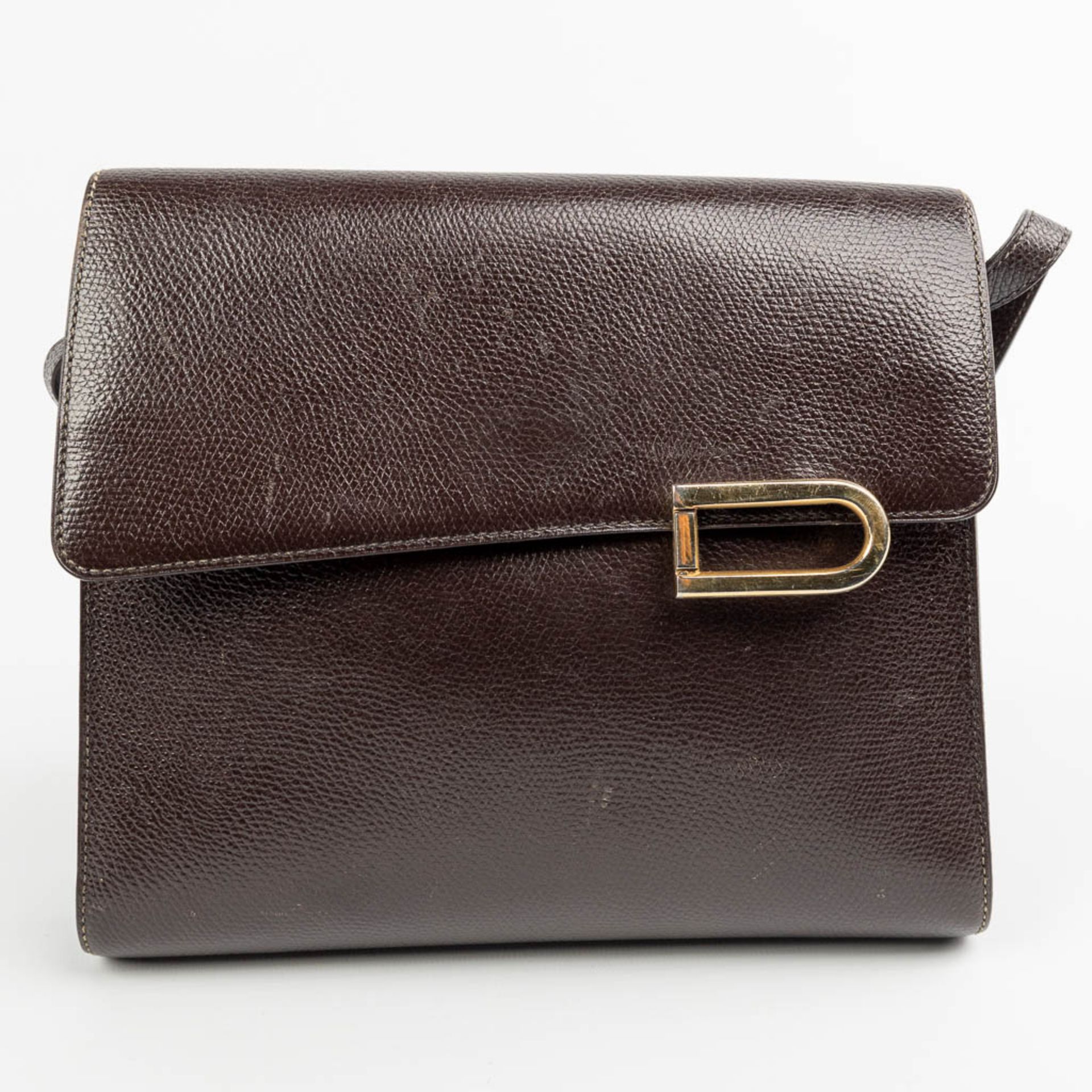 A purse made of brown leather and marked Delvaux. - Image 12 of 12