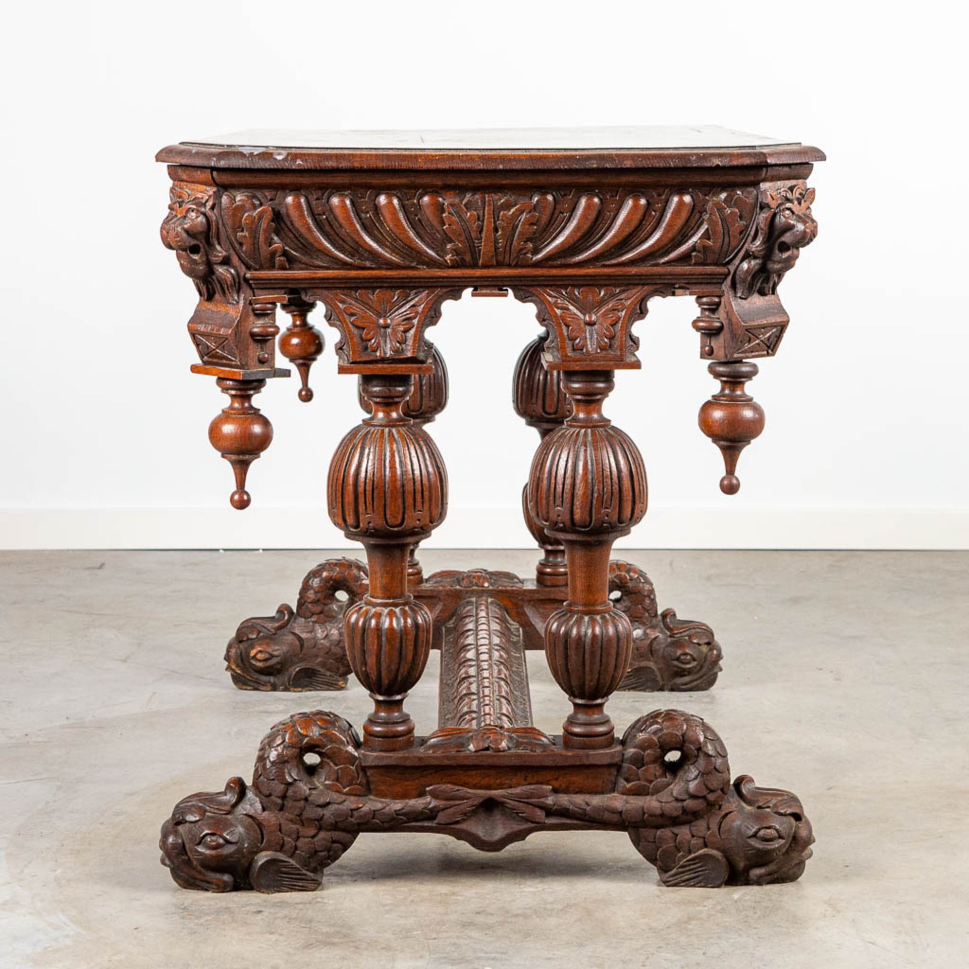 A desk made of oak and decorated with wood sculptured Dolphins. - Image 5 of 9