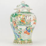 A vase with lid, made of Chinese porcelain with a double decor. 19th/20th century.