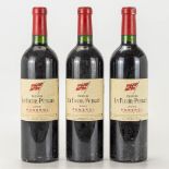 A collection of 3 bottles Chateau La Fleur Petrus, 2002.