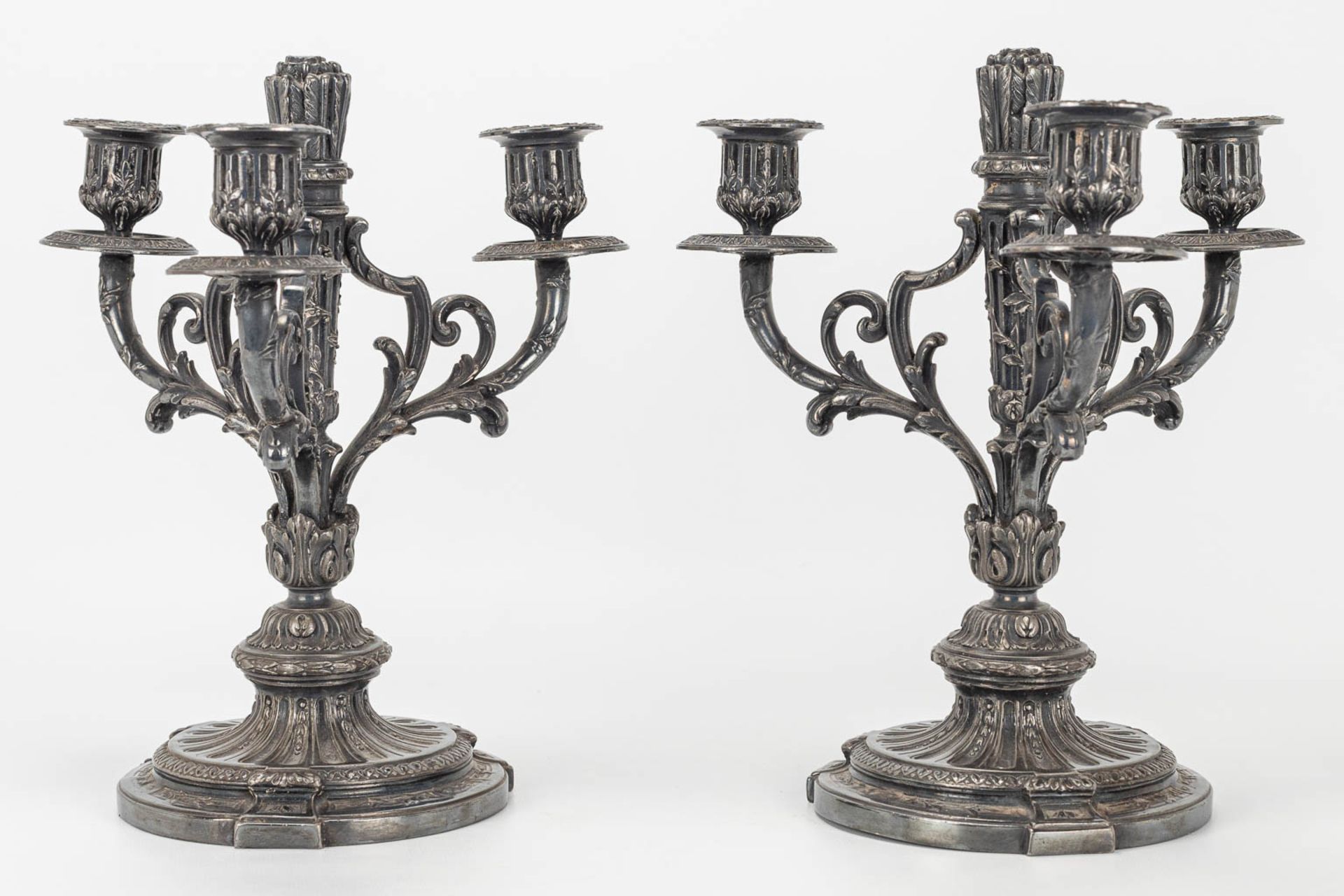 A pair of silver-plated Louis XVI-style candlesticks. - Image 8 of 9