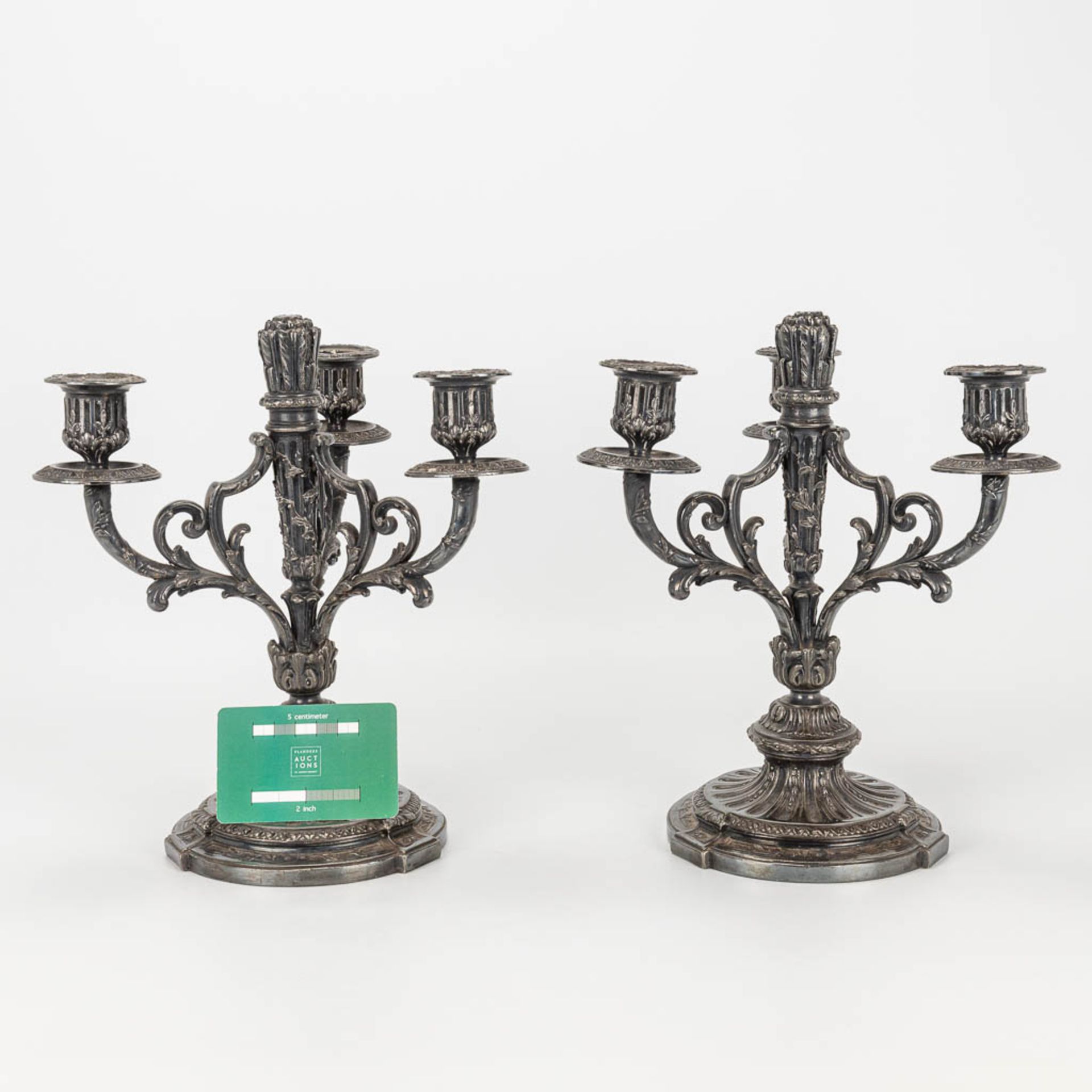 A pair of silver-plated Louis XVI-style candlesticks. - Image 3 of 9
