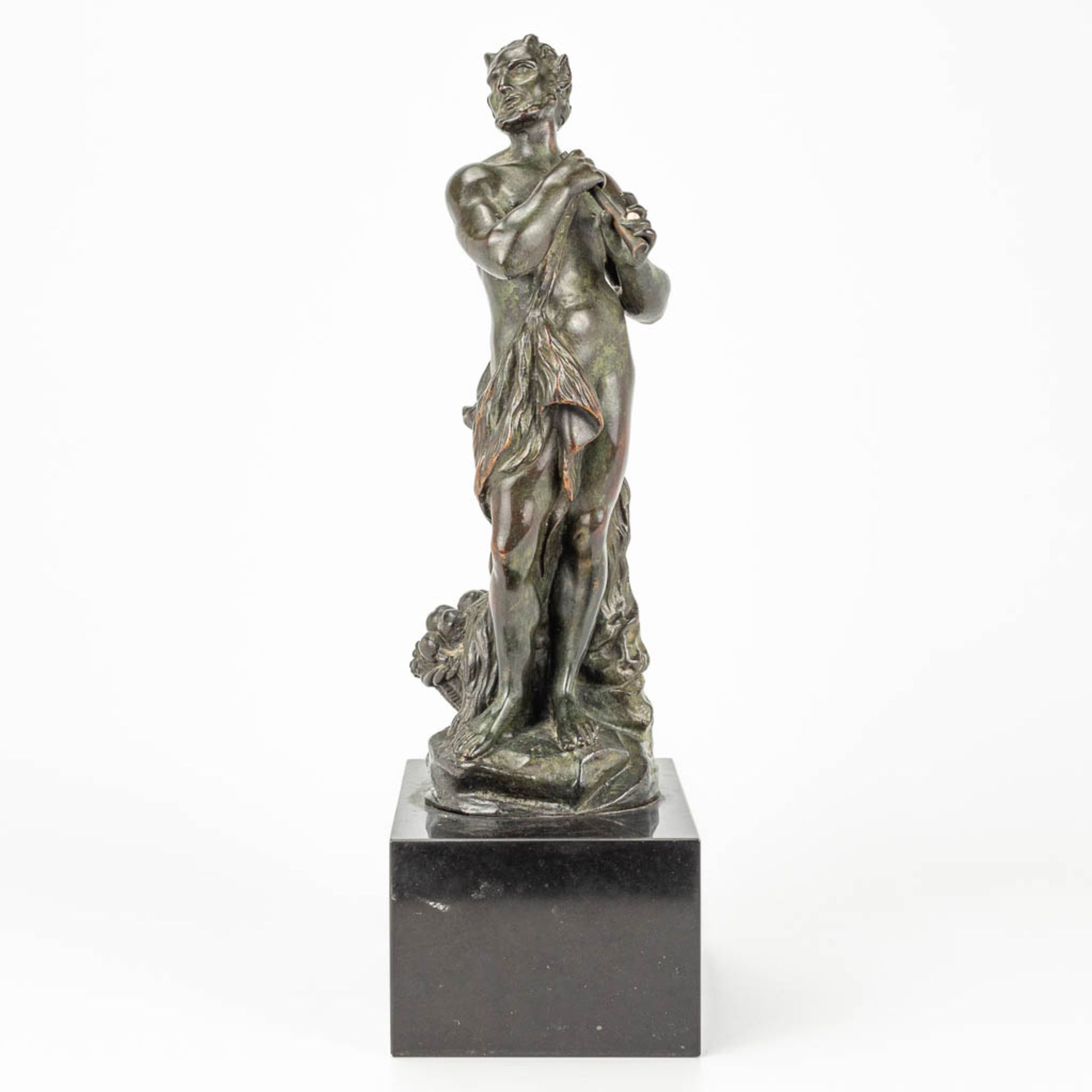 A Satyr figurine, made of bronze and mounted on a black marble base. - Image 3 of 10