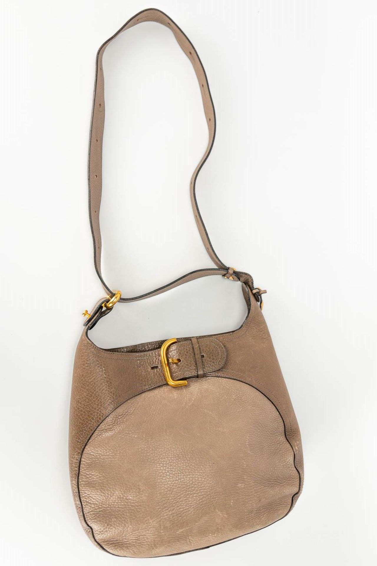 A purse made of brown leather and marked Delvaux. - Image 15 of 16