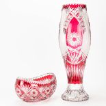 A large vase and bowl, made of crystal with red color. Made in Bohemia, 20th century.