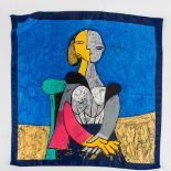 A foulard or shawl made of silk with an image of Pablo Picasso.