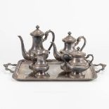 A silver-plated coffee and tea service, standing on a serving tray and marked Wiskemann.
