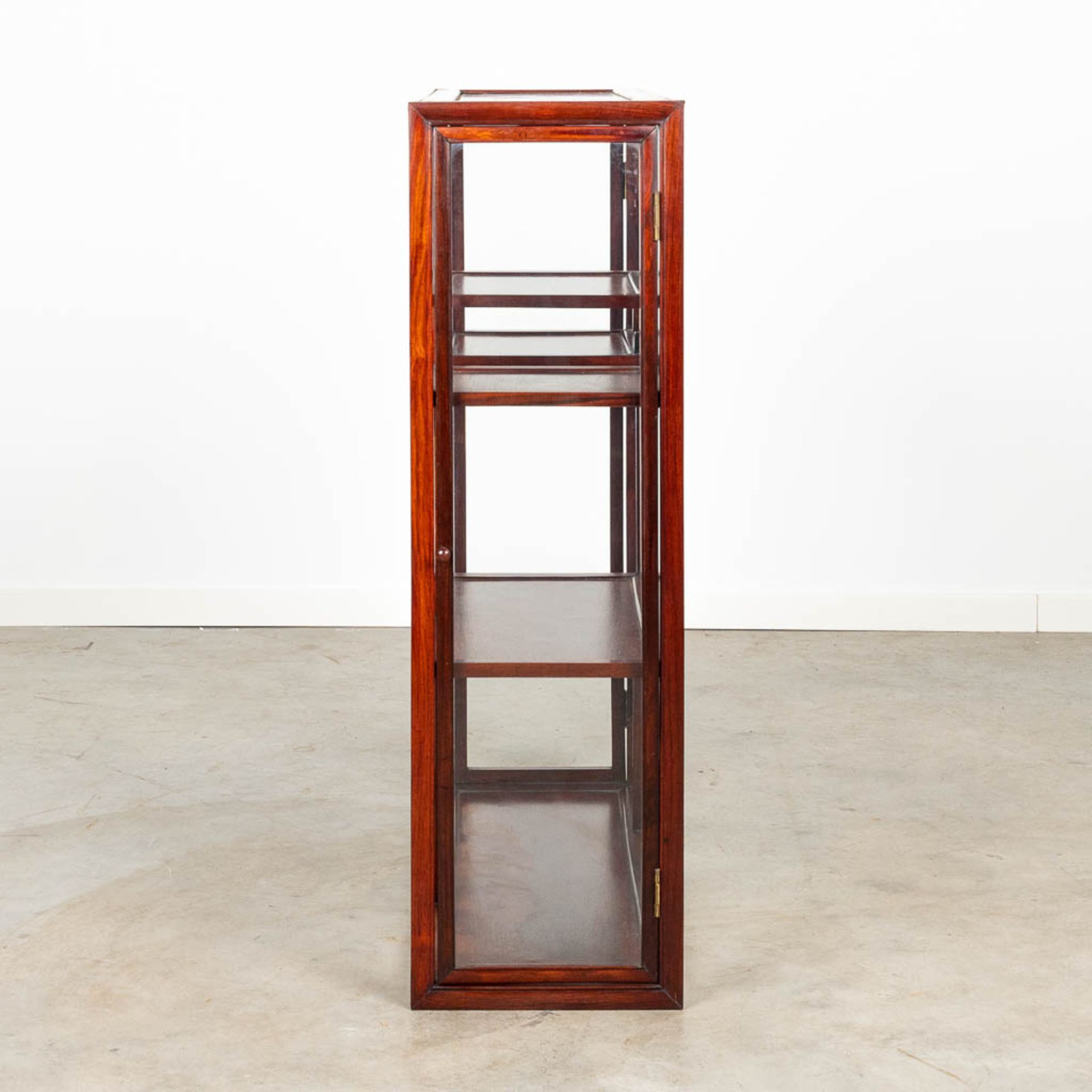 An Oriental display cabinet made of hardwood and glass. - Image 2 of 5