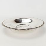 A bowl made of silver and marked Wolfers Freres and marked A835.