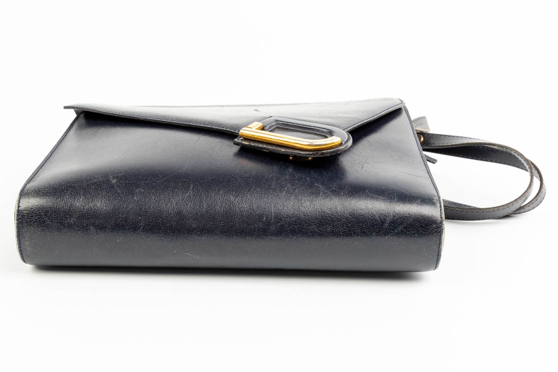 A purse made of black leather and marked Delvaux. - Image 9 of 10