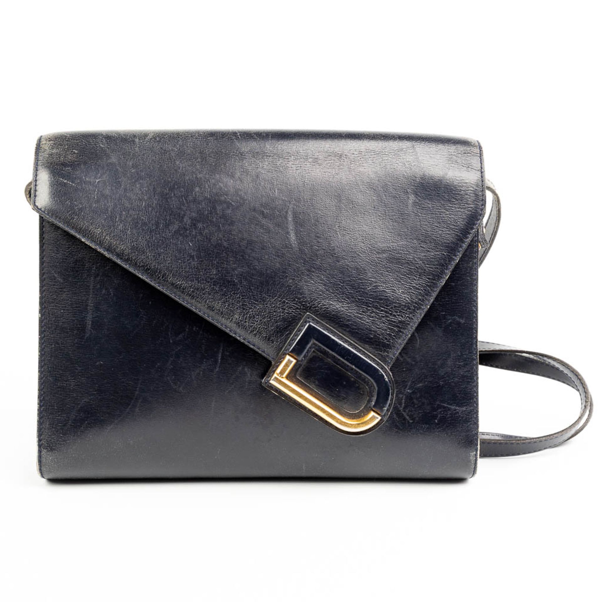 A purse made of black leather and marked Delvaux. - Image 8 of 10