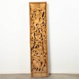 A large Balinese wood sculpture.