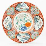 A plate made of Oriental porcelain, marked, 19th century.