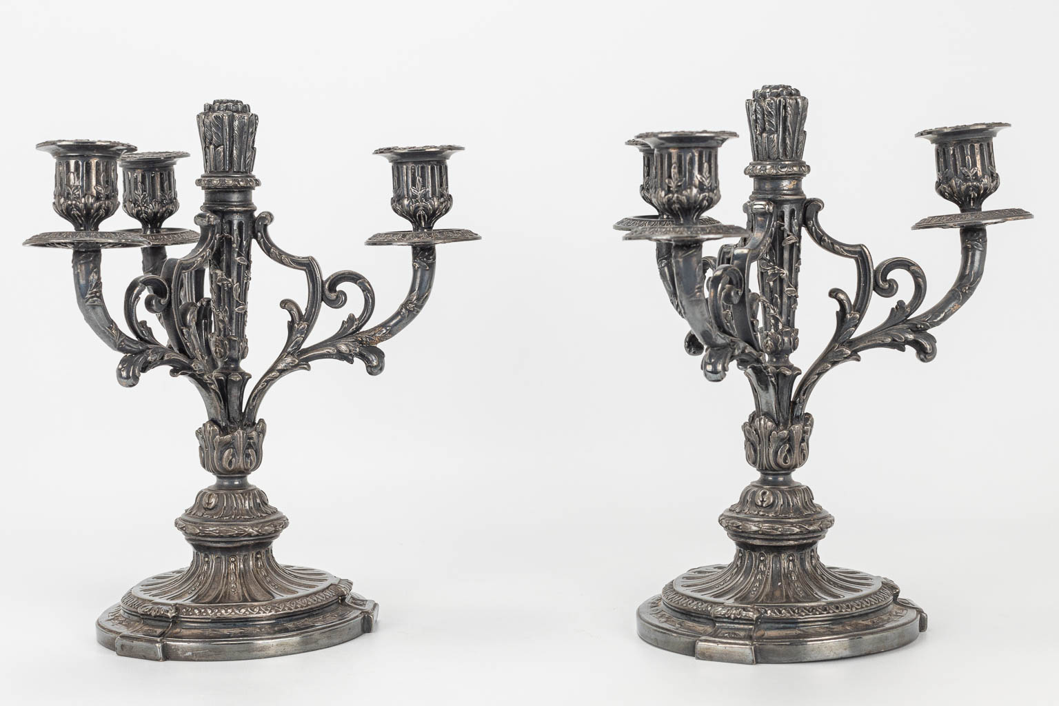 A pair of silver-plated Louis XVI-style candlesticks. - Image 5 of 9