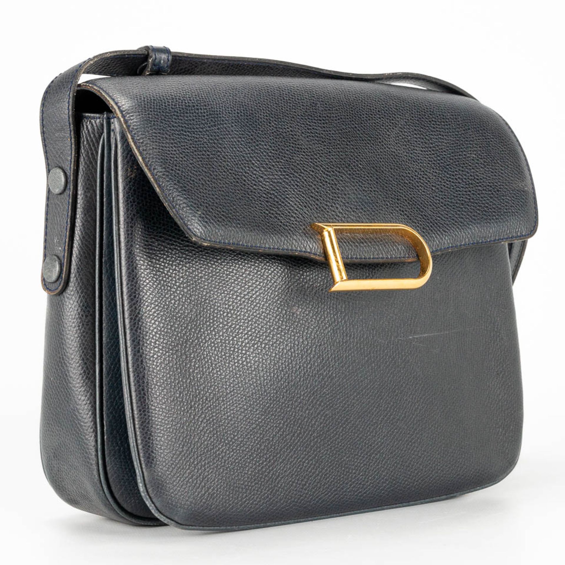 A purse made of black leather and marked Delvaux, with the original mirror. - Image 7 of 13