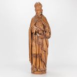 A wood sculpture of Holy Remoldus of Mechelen.