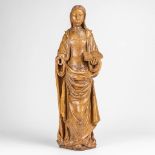 An antique wood sculptured statue of a lady with a book. Made of oak during the 18th century