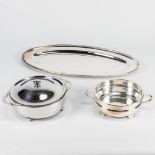 An assembled collection of silver-plated items, bowls, and a serving tray marked Italy, England, and